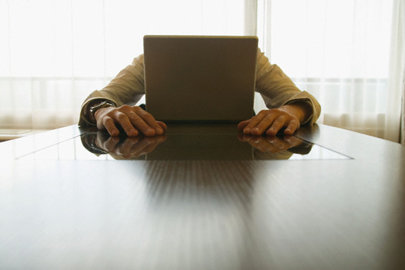 Man Stressed in front of Computer